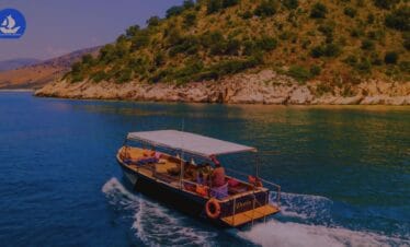 Peaceful sunset boat Sarande