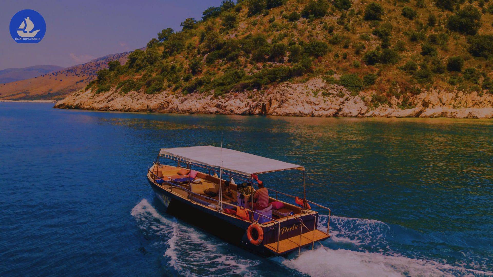 Peaceful sunset boat Sarande