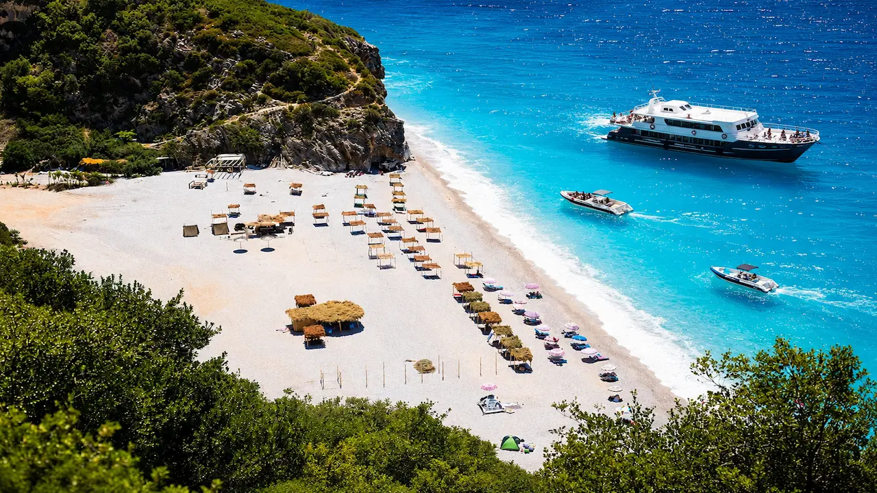 Luxury boat trip at Gjipe Beach in Himare with speedboats and crystal clear turquoise water