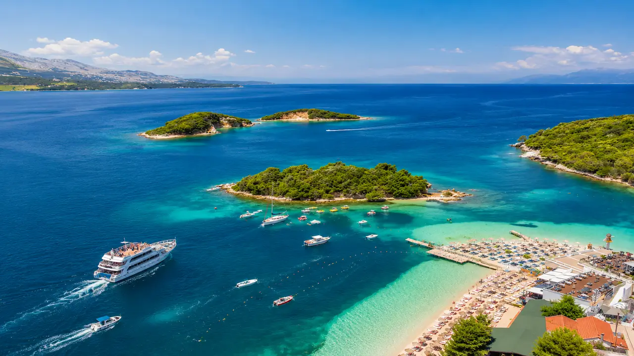 Boat tours in Ksamil with tourist boats near the Three Islands